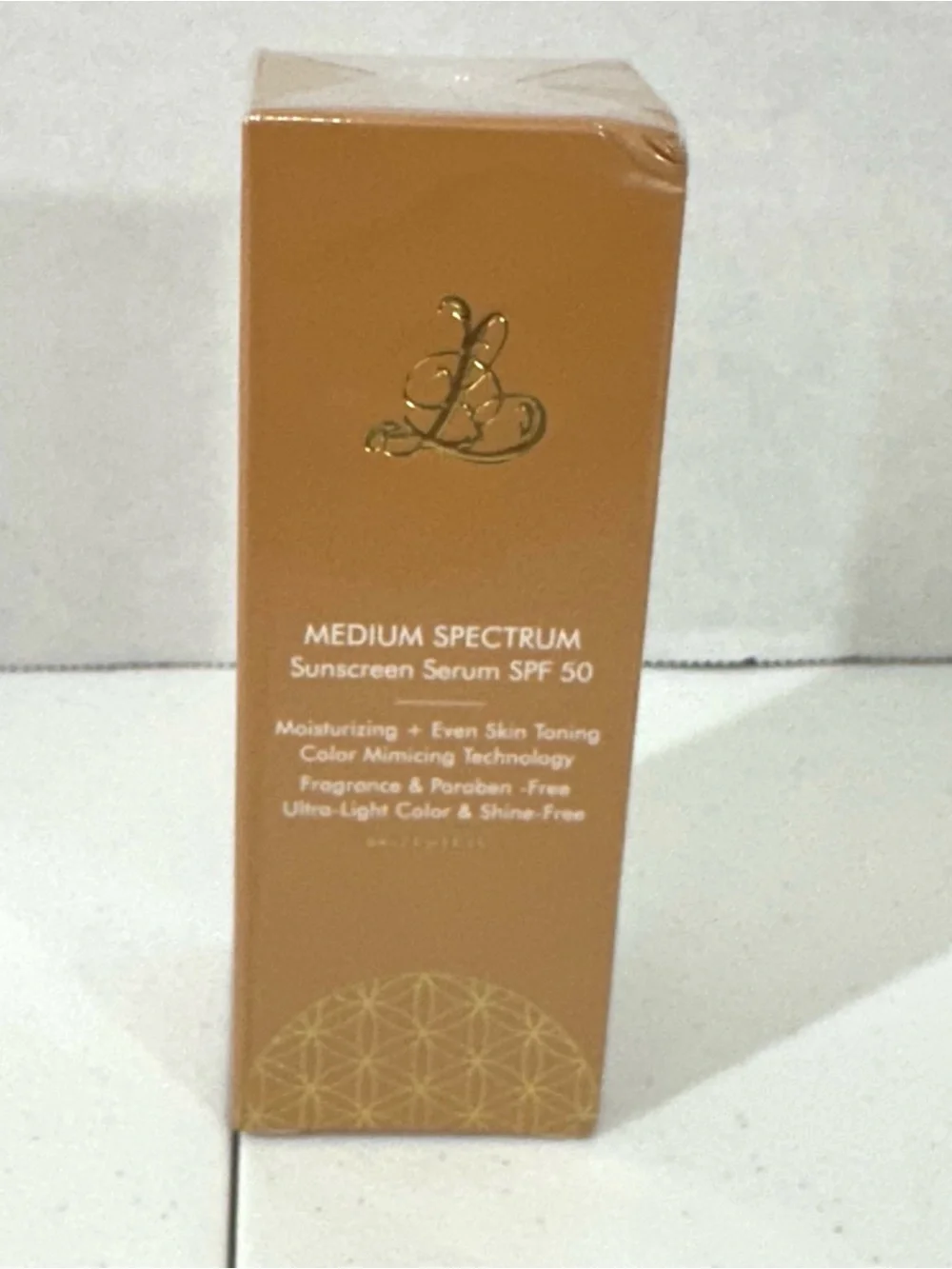 Medium Spectrum Sunscreen Serum SPF 50 - Beige
